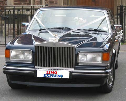 The car is a 1989 Rolls Royce Silver Spirit in Royal Metallic Blue