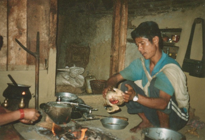 Gurung daai preparing dinner in Boghara