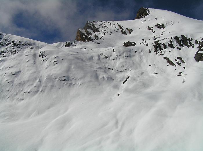 Final climb to the Kang La (the pass is just below the rocky outcrop in the upper centre of picture)